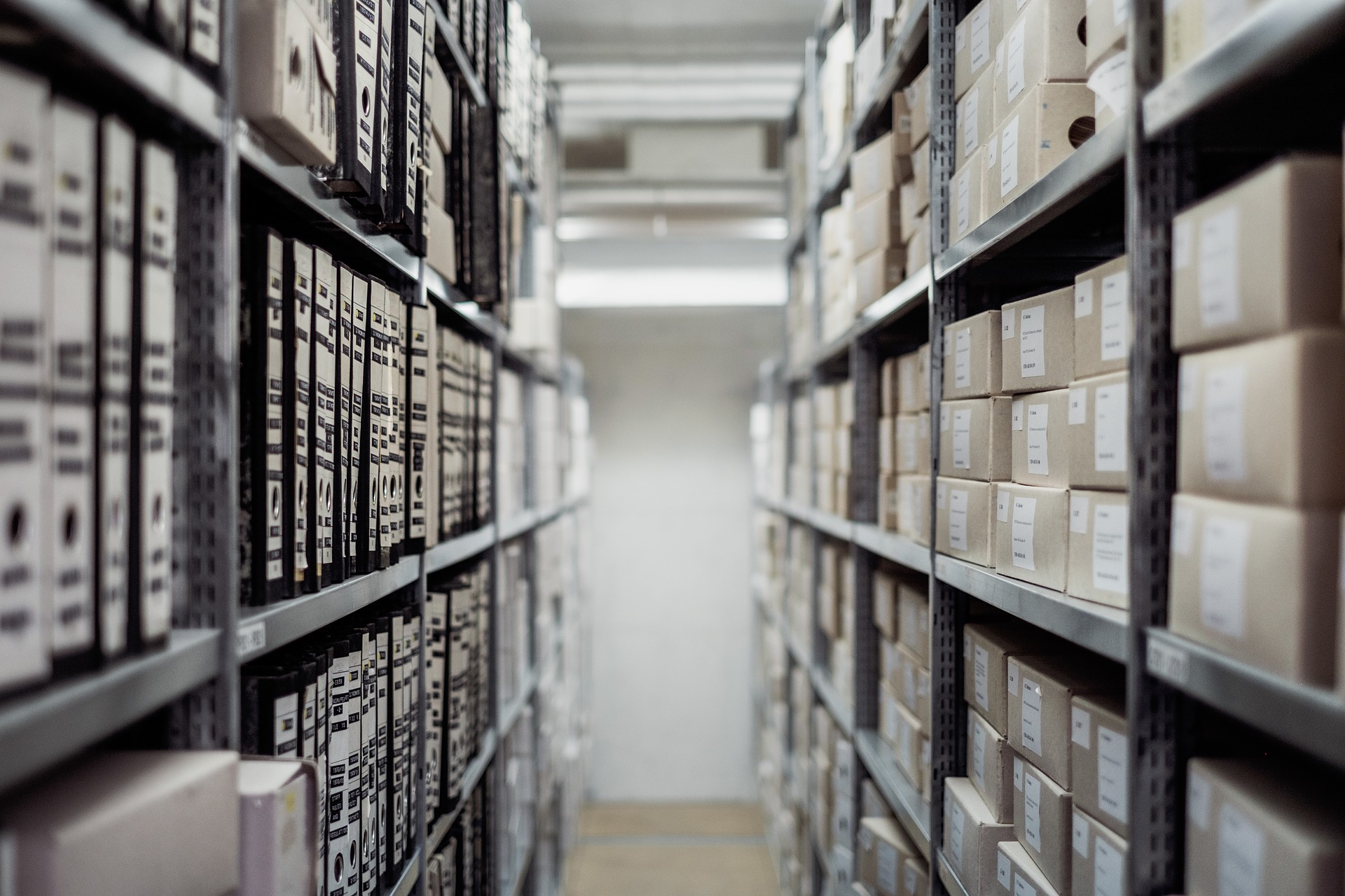 An archival document and storage boxes